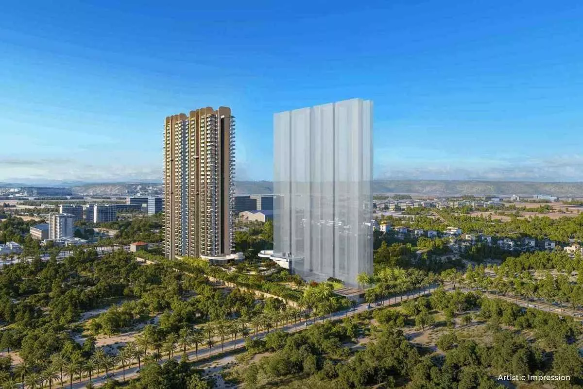 Conscient Elaira Residences high-rise residential tower surrounded by greenery, with a phase 2 tower